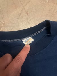 Image 3 of NFA on a vintage pocket t 