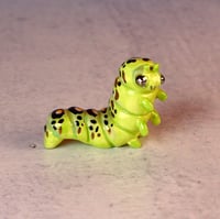 Image 1 of Caterpillar Figurine