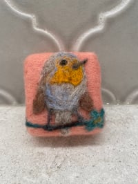 Image 1 of A small bird named Pinwheel