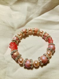 Image 2 of Snowflake stretch bracelet in pink