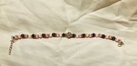 Image 2 of Glass 6mm cat's eye bead bracelet with pink crystal focal