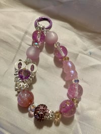Purple and pink phone chain with owl and acrylic teddy bear