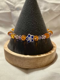 Image 1 of Glass flower bracelet in orange and blue