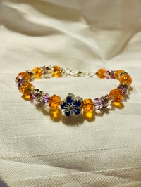 Image 2 of Glass flower bracelet in orange and blue