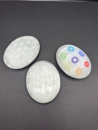 Image 1 of Selenite palm stone 