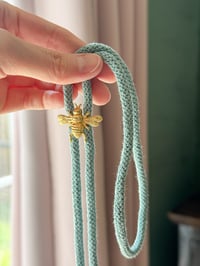 Image 3 of brass bee bolo tie