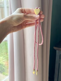 Image 2 of brass heart bolo tie