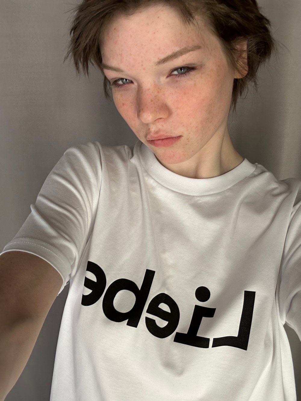 White organic cotton Tshirt with Liebe print