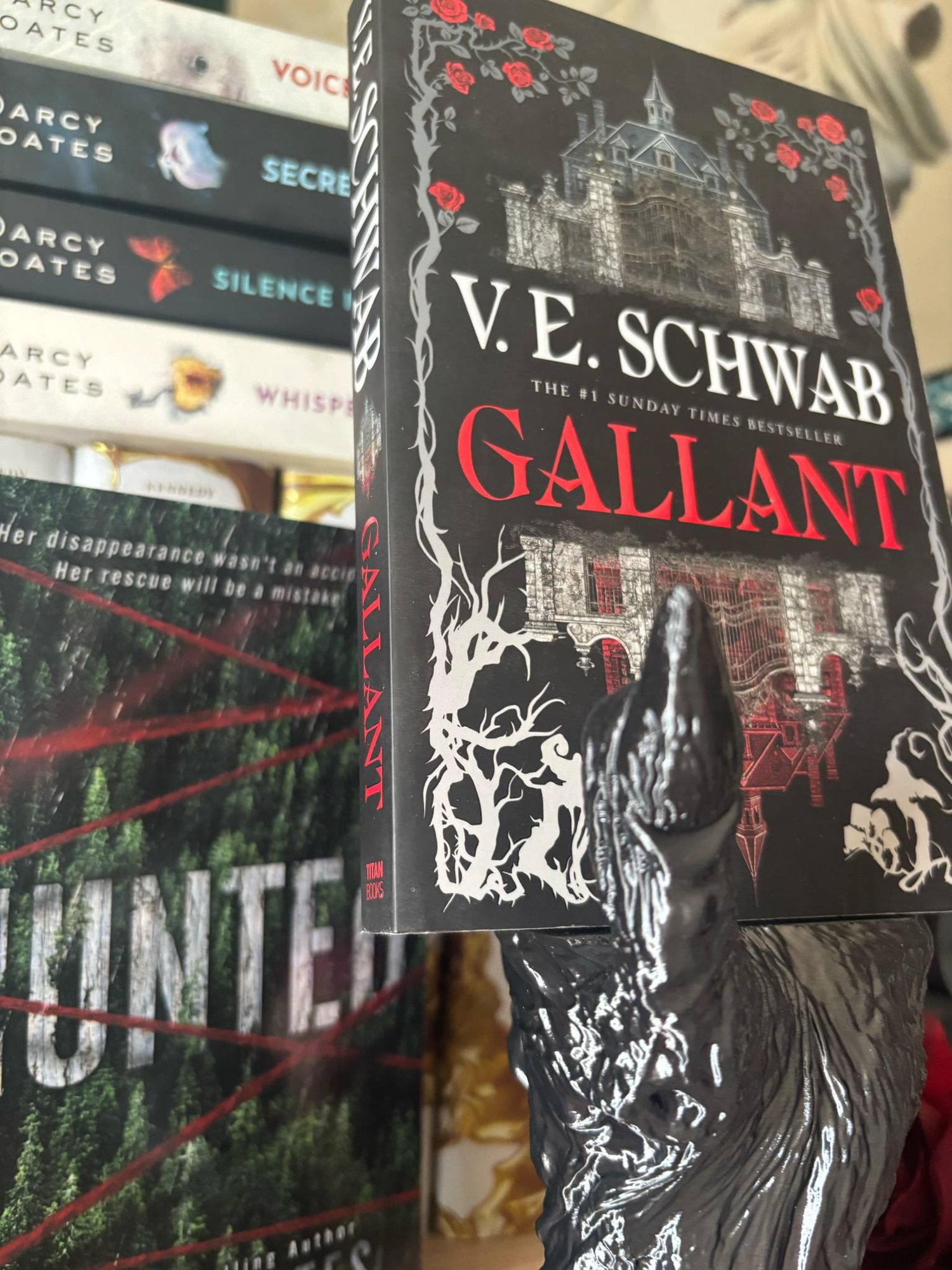 Image of Death's Grasp Book Display Haunted Book holder hand