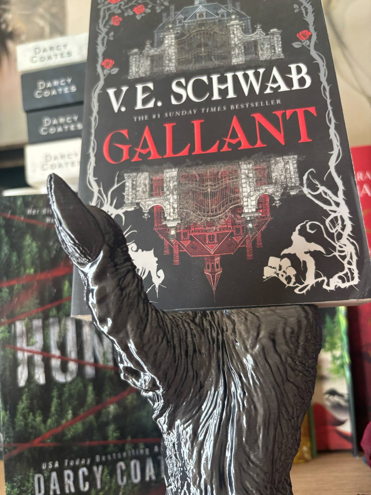 Image of Death's Grasp Book Display Haunted Book holder hand