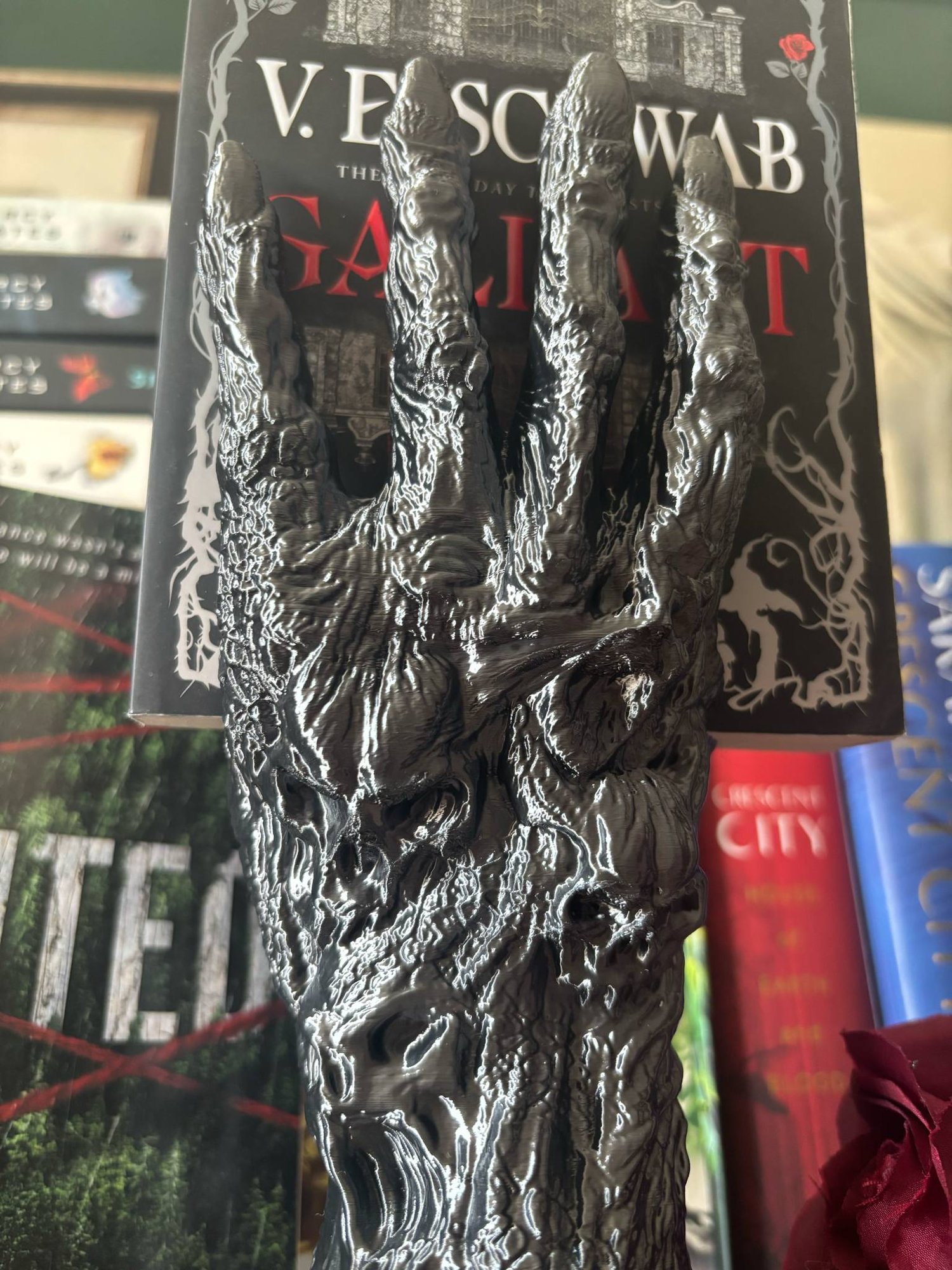 Image of Death's Grasp Book Display Haunted Book holder hand