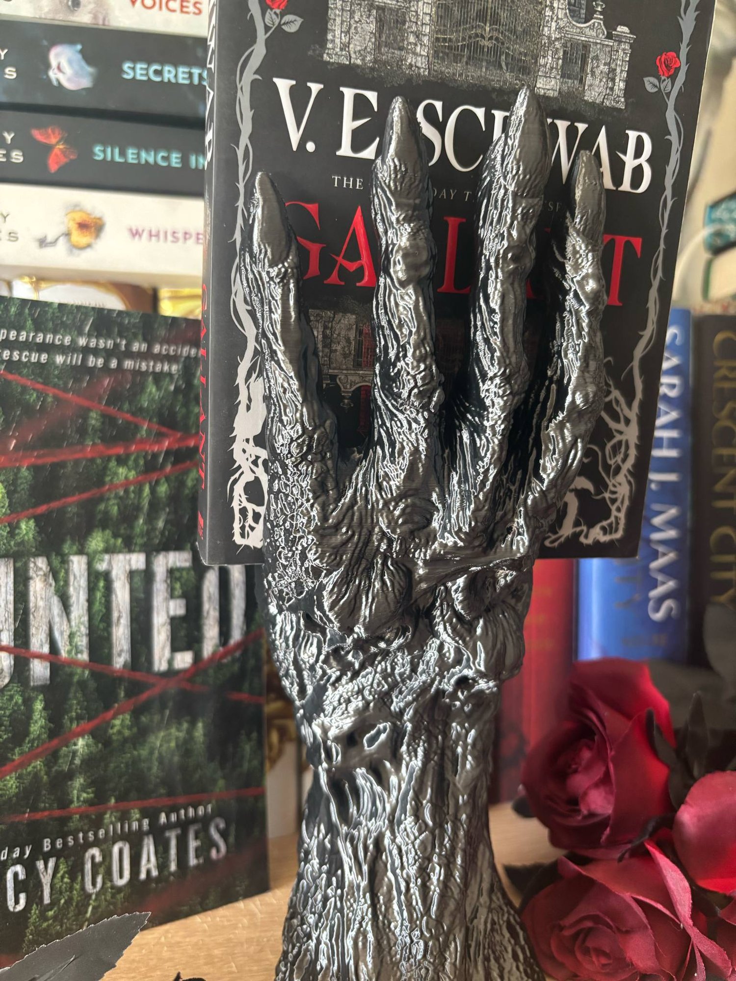 Image of Death's Grasp Book Display Haunted Book holder hand