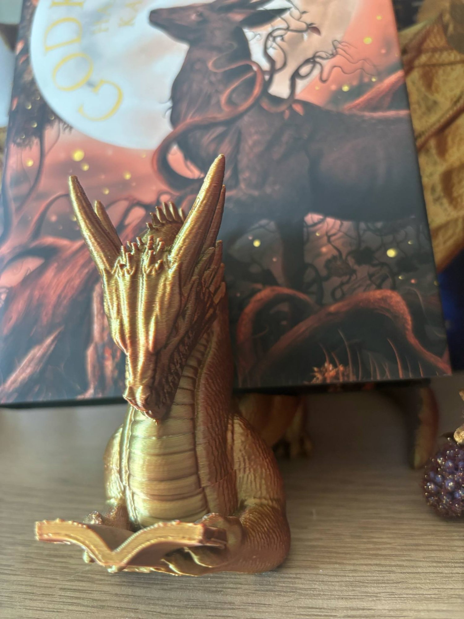Image of Dragon with book holder 