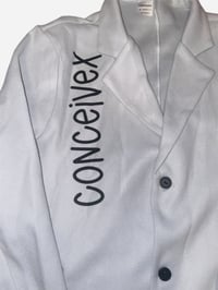 Image 4 of "Through Fashion We Connect" Peacoat