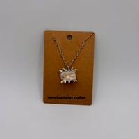 Spiked Sleeping Baby Trinket Pendant (#1070)
