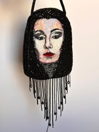 Image 1 of Morticia