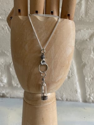 Image of Vintage silver necklace with hand & ship in a bottle charms 