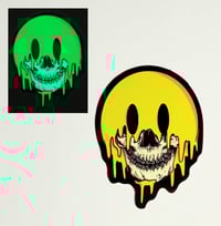Image 1 of Glow In The Dark Melting Smiley Face Skull Matte Vinyl Sticker 