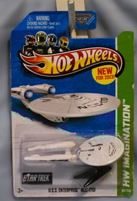 Image 1 of 2013 Hot Wheels White U.S.S. Enterprise NCC-1701 “Battle Damage” – Diecast Car NIP”
