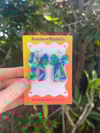 Aurora swirl bow earrings 