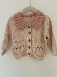 Image 1 of Knitted Baby Cardigan with Cat Pockets & Ruffle Collar