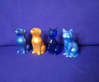 Resin dogs and cats