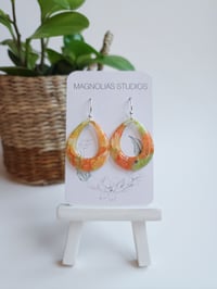 Image 2 of Peach Marble Margerys 