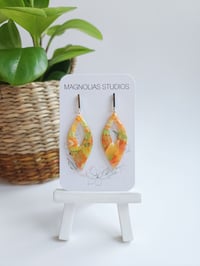 Image 2 of Peach Marble Brinns