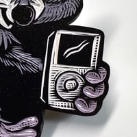 Image 3 of Raccoon with an iPod Carving