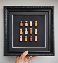 Image 1 of Framed Twelve.