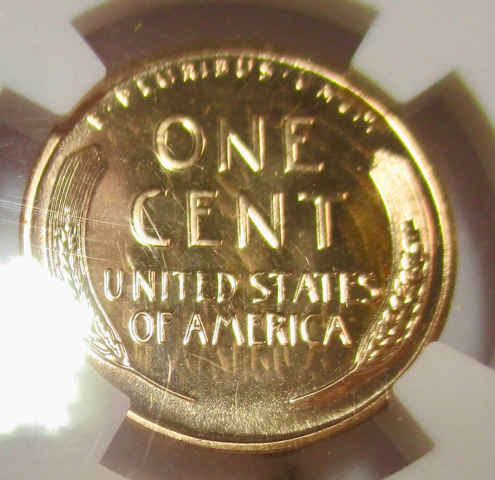 SPECIAL ON PROOF SINGLES: 1954 SLABBED PROOF 67 RED