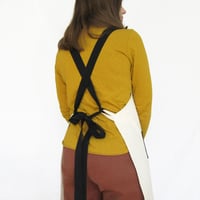 Image 6 of Unbleached canvas work apron with black adjustable crossback ties. No25