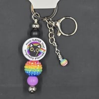 Image 4 of “Much Gayer Than Originally Planned” Cat Keychain – Bold, Quirky, and Rainbow-Powered