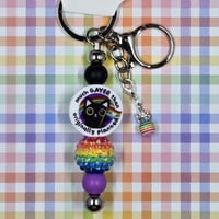 Image 1 of “Much Gayer Than Originally Planned” Cat Keychain – Bold, Quirky, and Rainbow-Powered