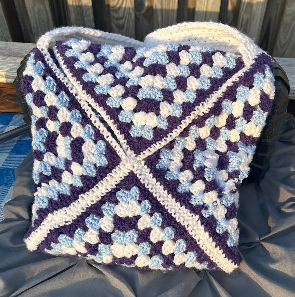 Image of Cascading Colors Shoulder Bag with a Button Clasp. 