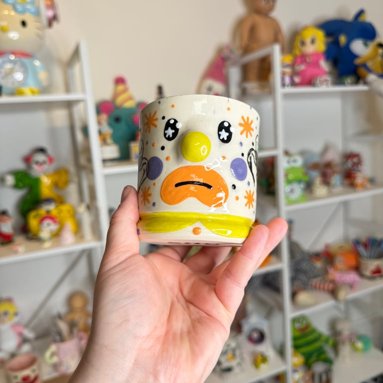 sad yellow cup Image 5