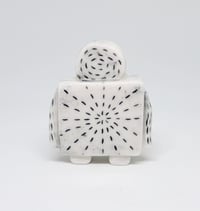 Image 1 of a robot who stitches