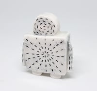 Image 2 of a robot who stitches