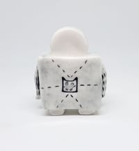 Image 3 of a robot who stitches