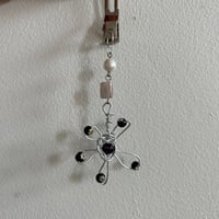 Image 1 of black flower hair clip