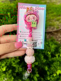 Pink Bubu Shaker Badge Reel