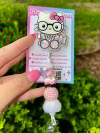 Kitty Glasses Shaker Badge Reel