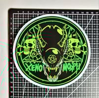 Image 2 of Large Xenomorph Demon Alien Pentagram With Human Skulls Matte Vinyl Sticker