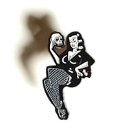 Image 1 of Voluptuous Goth Beauty In Fishnet Stockings Holding A skull Enamel Pin