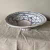 Deep footed shallow bowl