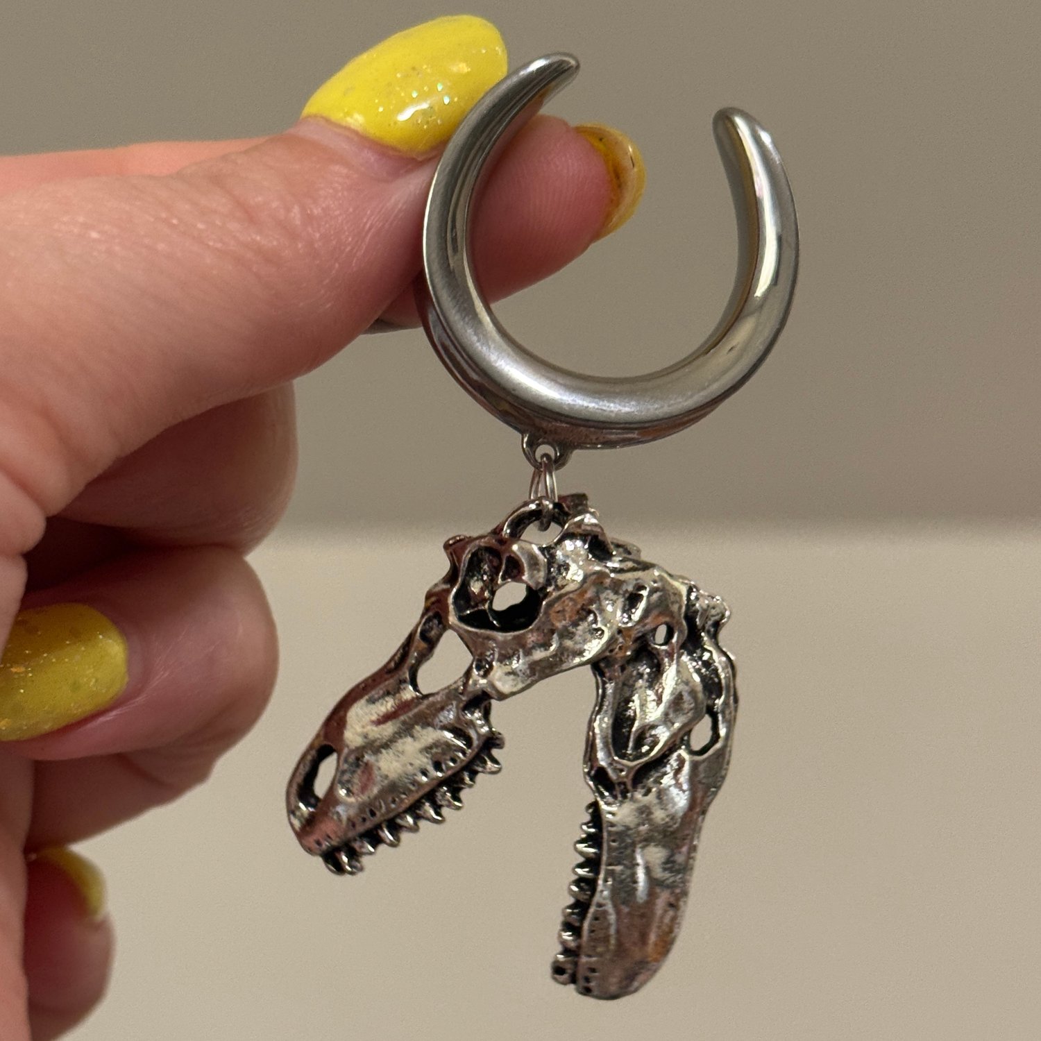 Image of Dino Skull Saddle Dangles (sizes 2g-1 12)
