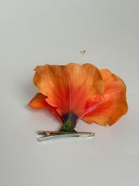 Image 2 of orange hibiscus clip