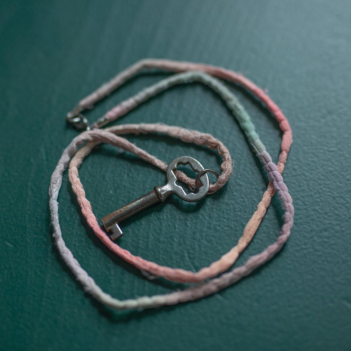 Sunburst skeleton key on silk "Cotton Candy" cord