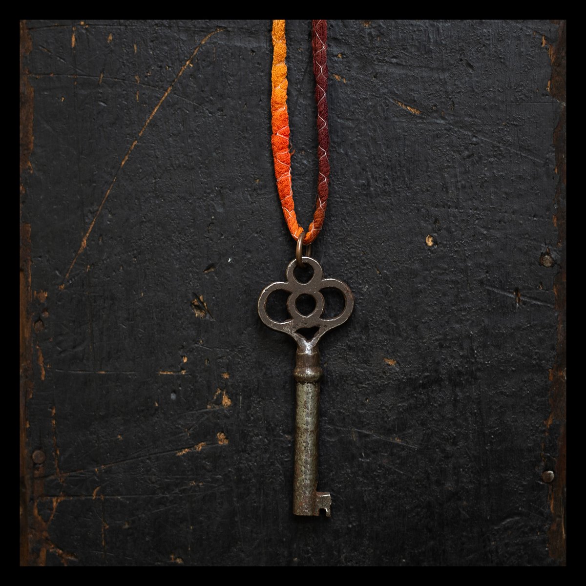 Ornate key on silk "Sunset" cord