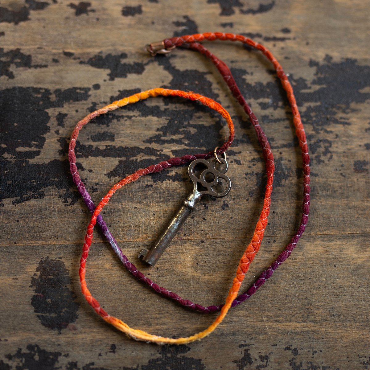Ornate key on silk "Sunset" cord